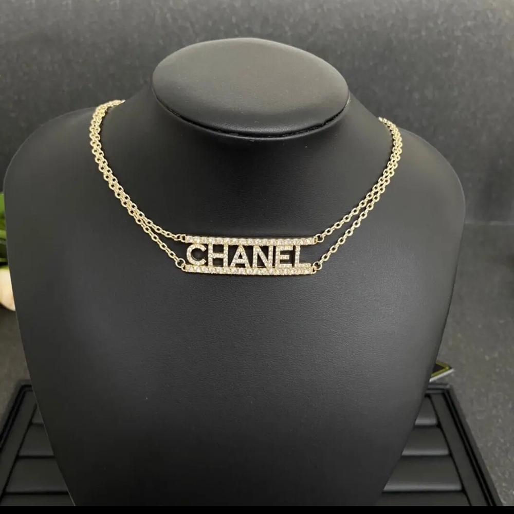 Chanel Gold Necklace with Logo Pendant